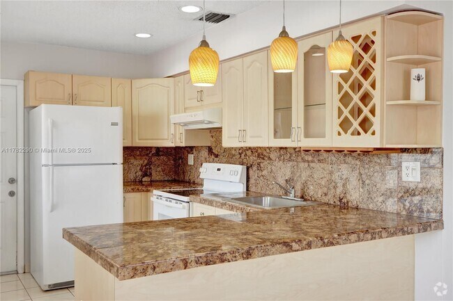 Building Photo - 2474 SW 17th St Unit Front Rental