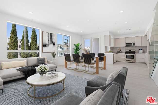 Building Photo - 11727 Kiowa Ave Unit 402