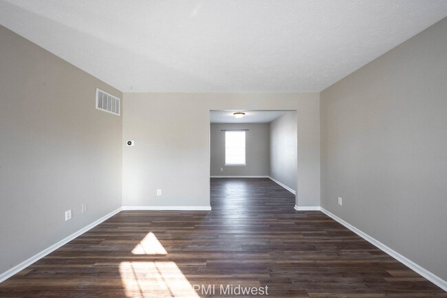 Photo - "Spacious 4-Bedroom Gem with Finished Base... Apartment
