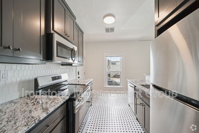 Building Photo - 1437 S Peoria Ave Rental