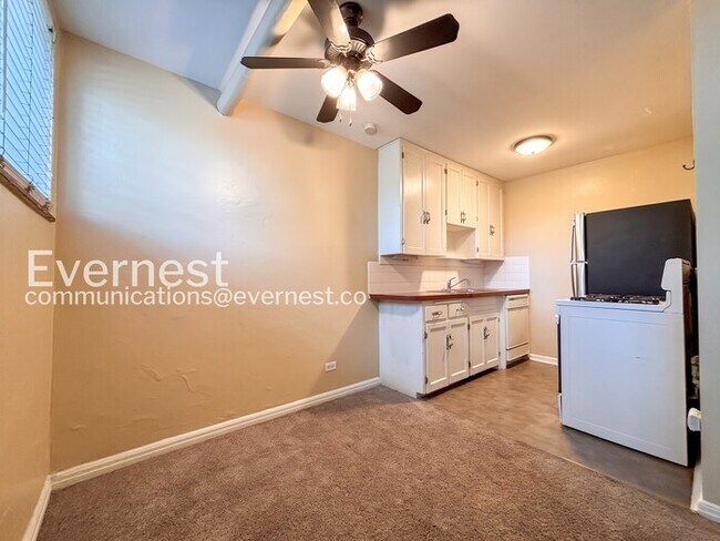Photo - 1 Bed, 1 Bath Condo with Modern Amenities / Available Soon! Unit A