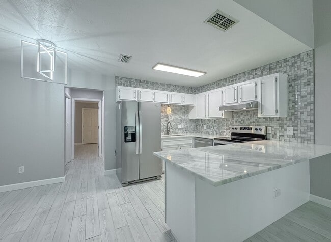 Photo - MODERN! Walk to FSU 2/2 w/ Marble Counters, Stainless Steel Appliances, & Privacy Fenced Yard! Av...