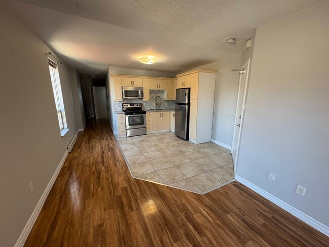 Photo - 2 Bedroom On Corner or King and Locke St Includes Parking Unit 3