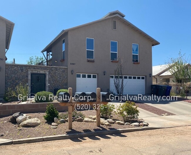 Building Photo - 1060 E Miles St Unit 02