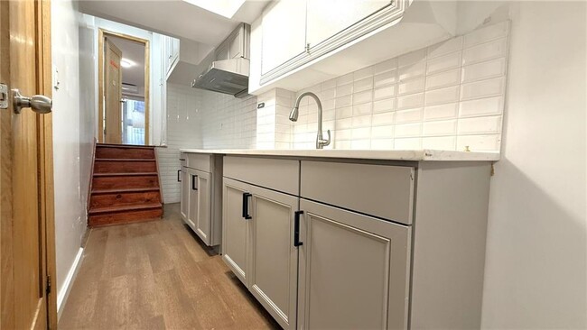 Building Photo - 8670 20th Ave Unit 1