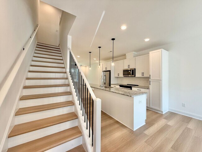 Photo - **OFFERING $125 RENT DISCOUNT FOR FIRST 6 MONTHS** Newly Built 4BD, 3.5BA Raleigh Townhome in a G...
