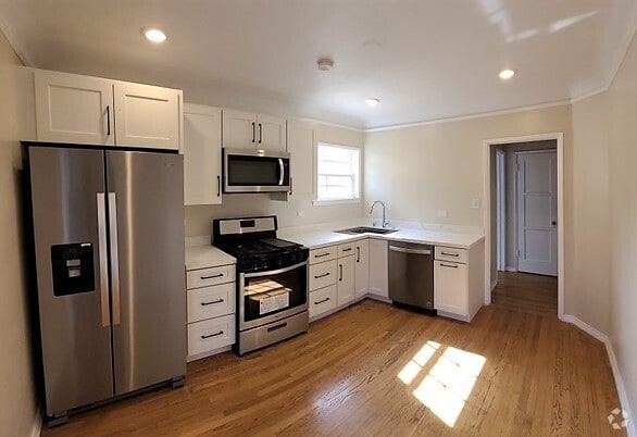 Building Photo - 1714 N Ogden Dr Unit Top Floor Rental
