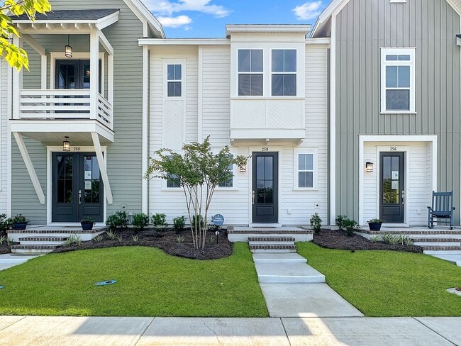 Building Photo - Beautiful, 3-Bedroom Midtown Nexton Townhome with Garage & Amenities