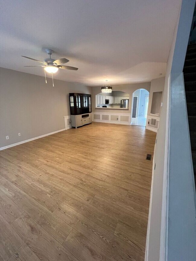 Photo - Spacious 2-Bedroom Townhome with Finished Studio Suite – Prime Location!