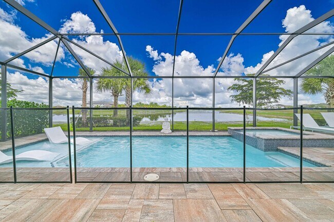 Photo - ** Single Family Home ~ Verdana Village ~ 3 Car Garage ~ Salt Water Pool & Lake Views **