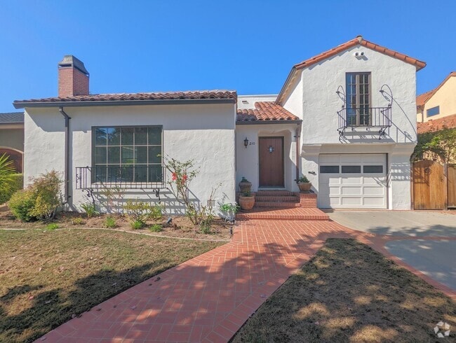 Building Photo - Spanish-Style Home on Treelined Street in ...