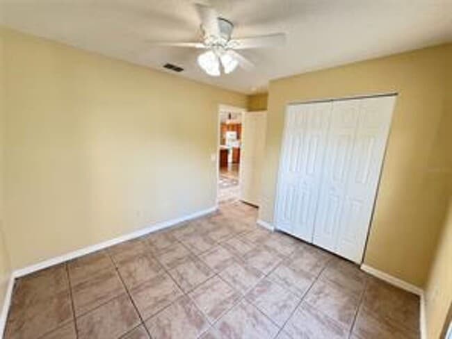 Photo - Charming 3-bed, 2-bath POOL home with 2-car garage. Features ceramic tile flooring, updated kitch...