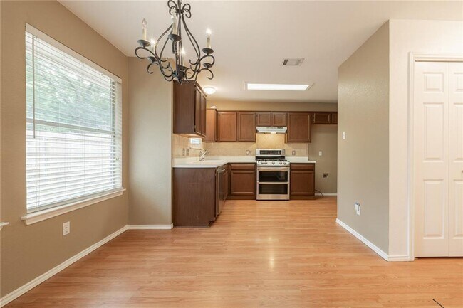 Photo - No Carpet! Tons of Space! Beautiful backya...