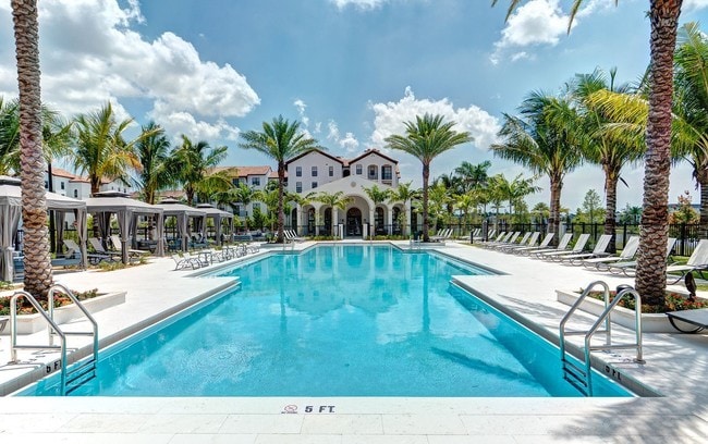 Resort Style Pool with Private Cabanas and Expansive Sunning Deck