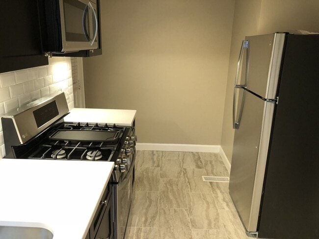 Building Photo - W King Ave 101-101.5 MLR Unit 101.5 Top