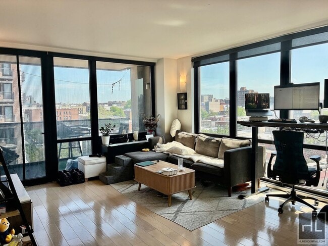 Photo - Stunning rent stabilized 1 bedroom with private balcony, onsite laundry, gym & roof deck Unit 6C