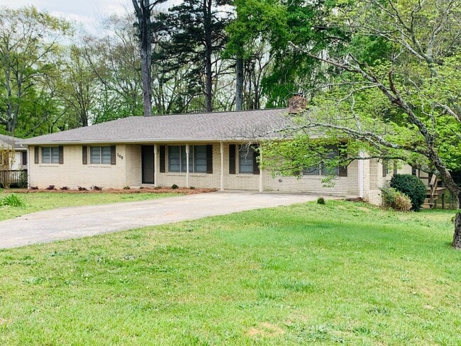 Photo - Wow, great location, newly renovated, 4 beds/2 bath, private fenced yard, sun room/office, must see!