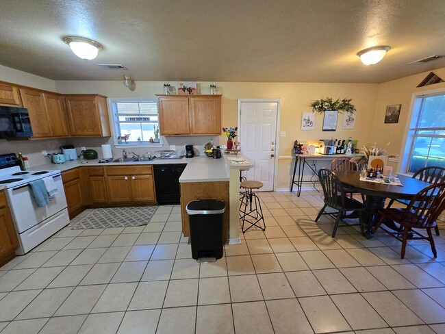 Photo - Bryan - 3 bedroom / 2 bath duplex with fenced in yard.