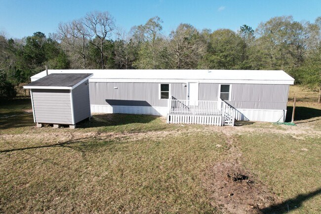 Building Photo - 16428 Jireh Rd Unit Single-Family Manufactured