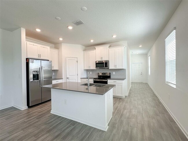 Photo - 1408 Roxy Ln