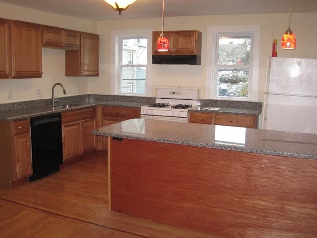 Building Photo - No Brokers Fee, Parking Included, Porch, Eat-in Kitchen, Laundry on a Site