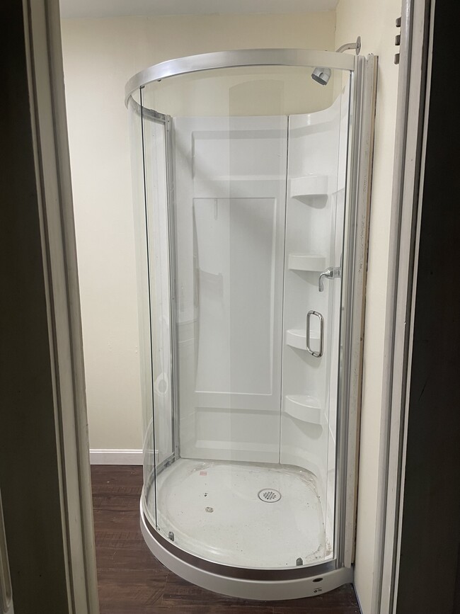 Standing shower - 301 Riverside Ave Apartments Unit 1stfloorback