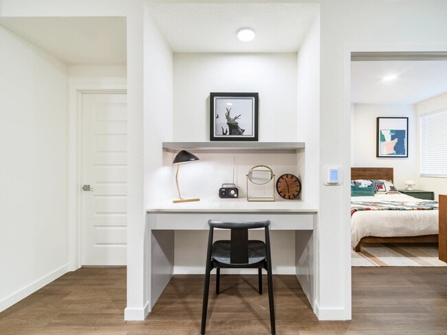 Built-in workspace with open shelving and dedicated task space, offering a convenient spot for remote work, study sessions, or daily organization.