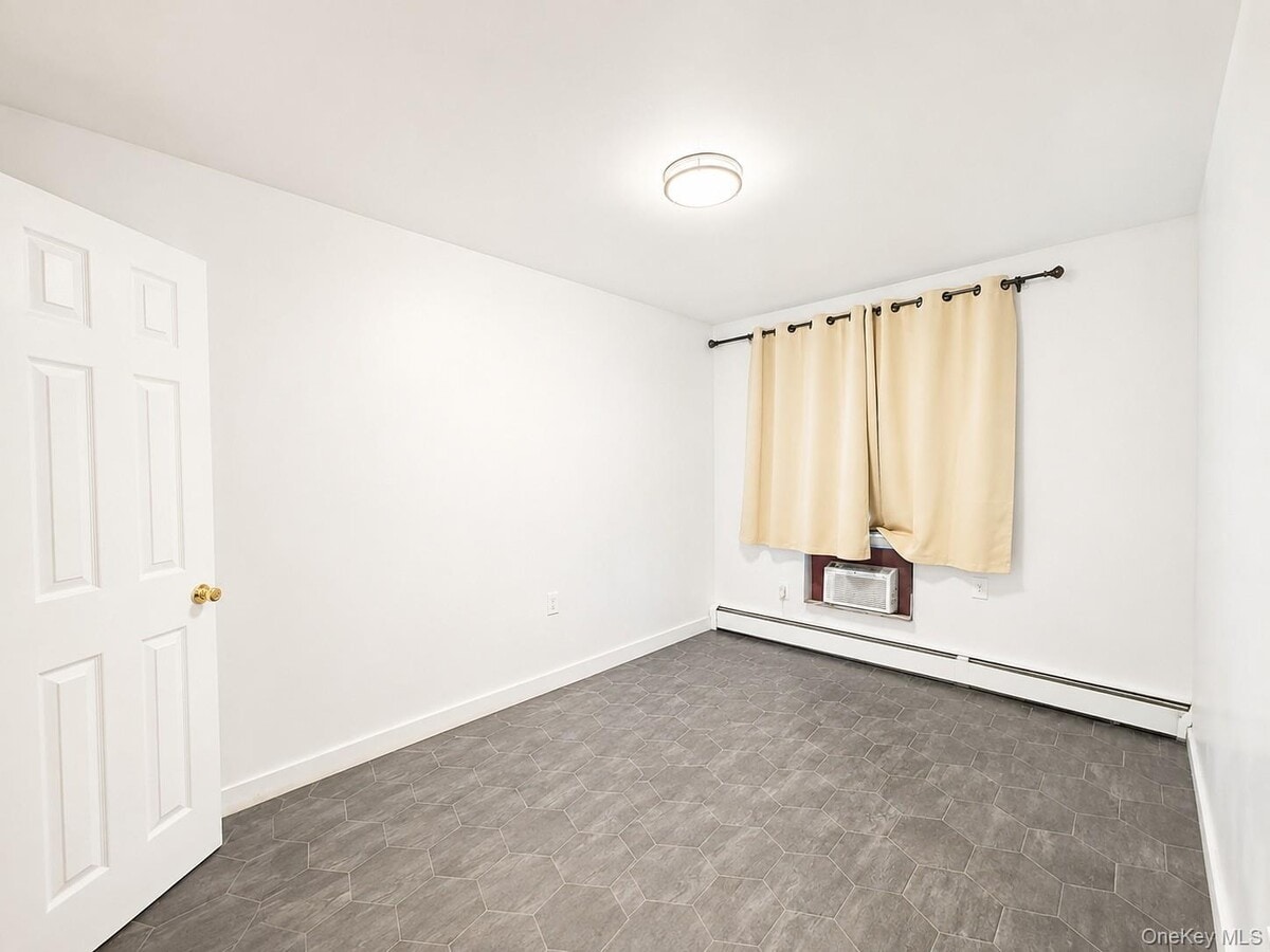 Photo - 61-55-55-98 98th St Unit 2A