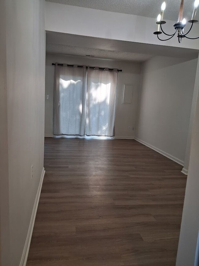 Photo - Charming 3BR Townhouse with Fenced Backyard and Community Pool