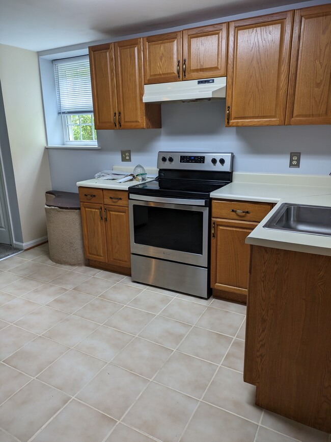 Kitchen with refridgerator, sink, oven - 11914 Proctor Ct Unit Apartment #1