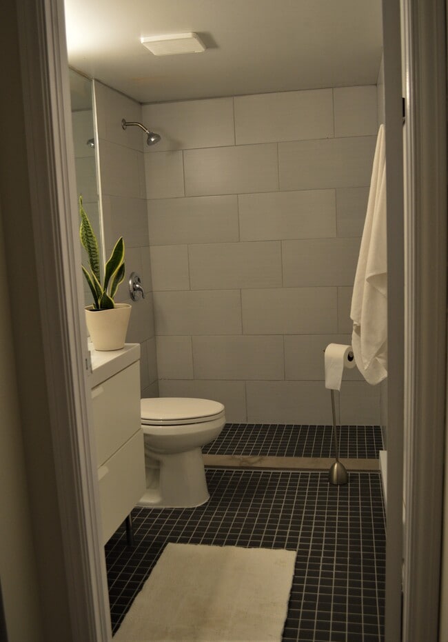 Photo - Storage-Rich Beachside Living with Modern ... Unit Lower