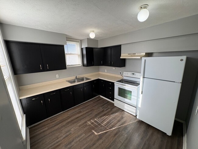 Photo - Lovely & Spacious 4-Bedroom Single-Family Home with Open Backyard