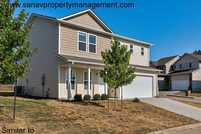Photo - Stunning 4-Bedroom Home in Prime Norwalk Location with Open-Concept Living with fenced backyard