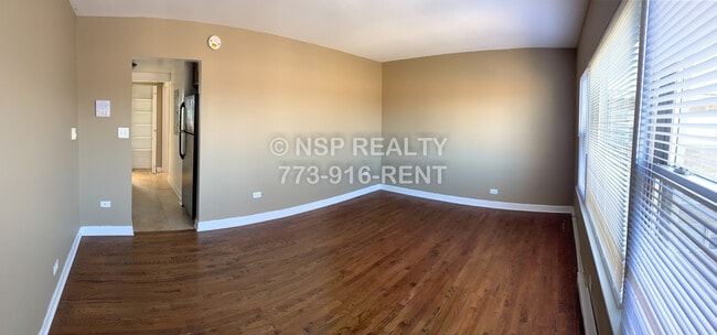 Building Photo - 7628 N Milwaukee Ave Unit 1B Rental