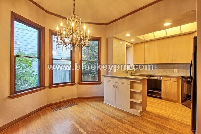 Photo - First Month Fee on a 12 Month Lease!  2 Bed, 1 Bath 2 Story Unit with Victorian Architectural Detail