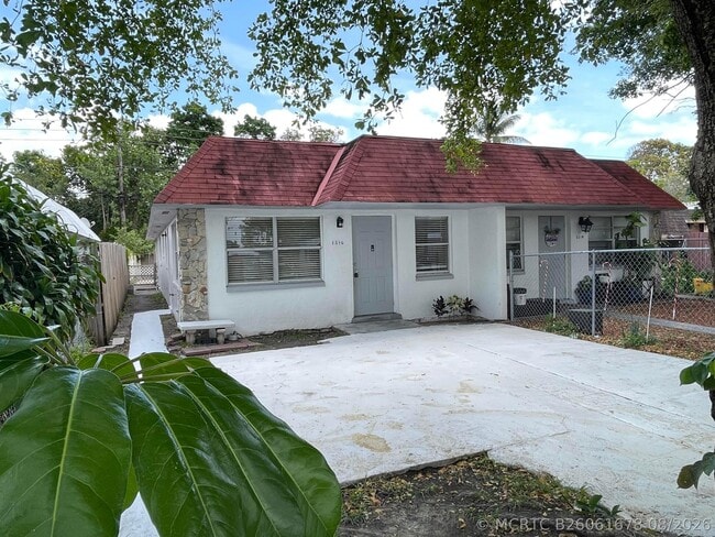 Building Photo - 1316 NW 8th Ave Unit A