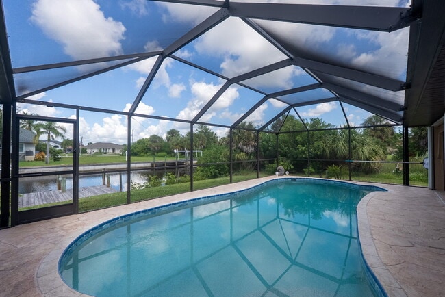 Photo - 3 BEDROOM • 2 BATHROOM • PRIVATE POOL • WATERFRONT • BOAT LIFT • ZERO DEPOSIT MOVE-IN AVAILABLE