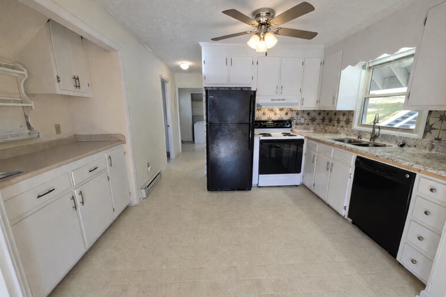 Photo - Light-Filled 3BR Home with Wraparound Deck, Convenient to Town