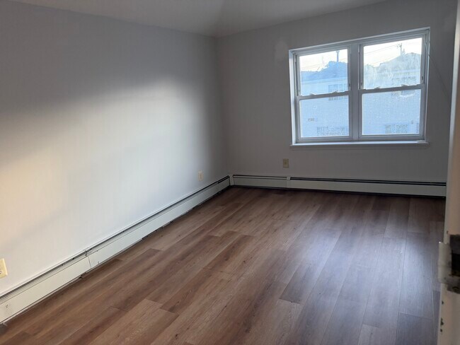 Photo - 463 Beach 68th St Unit 4 bed 2 bath for 3 bed price