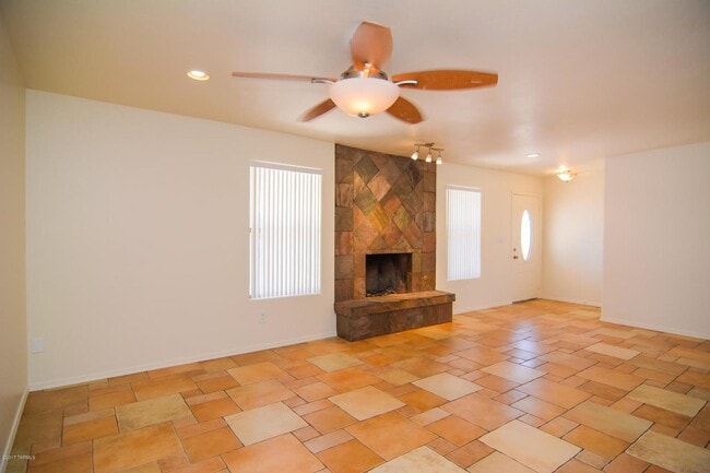 Photo - Spacious 4BR/2BA Tucson Home | Modern Tile Floors & Private Fenced Yard