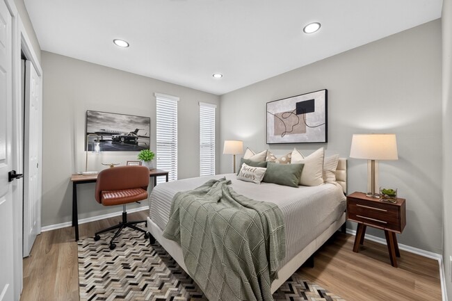 Step into a serene retreat at The Woods at Ambler. This beautifully designed bedroom blends comfort with modern elegance, featuring ample natural light and stylish decor. Embrace your ideal living space today! Schedule a tour to learn more.
