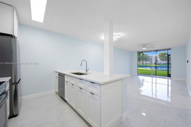 Building Photo - 7900 NW 50th St Unit 104