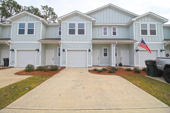 Photo - Don’t Miss This 3BR Townhome in North Pensacola — Garage, Modern Finishes, Community Pool & Easy ...