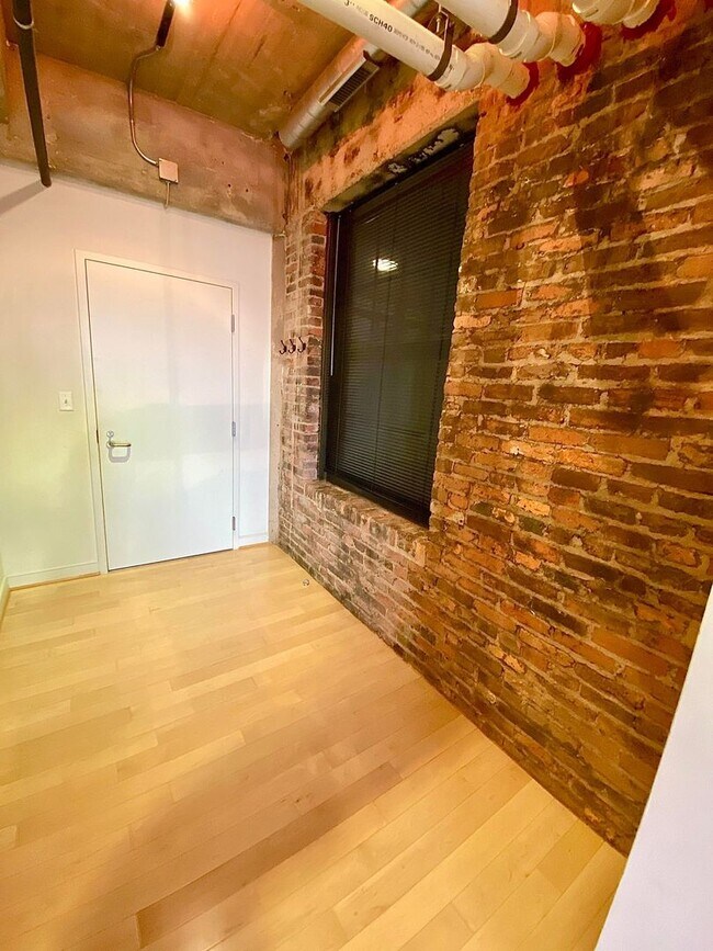 Photo - Stunning Industrial-Contemporary One Bedroom Condo- Parking included!