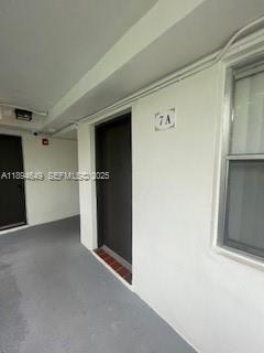 Building Photo - 465 S Royal Poinciana Blvd Unit 7A