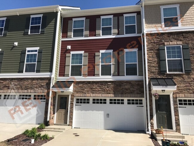 Building Photo - Beautiful 3 Story 3 Bedroom Townhouse with Huge 1st Floor Flex Space with Access to Patio + 2 Car...