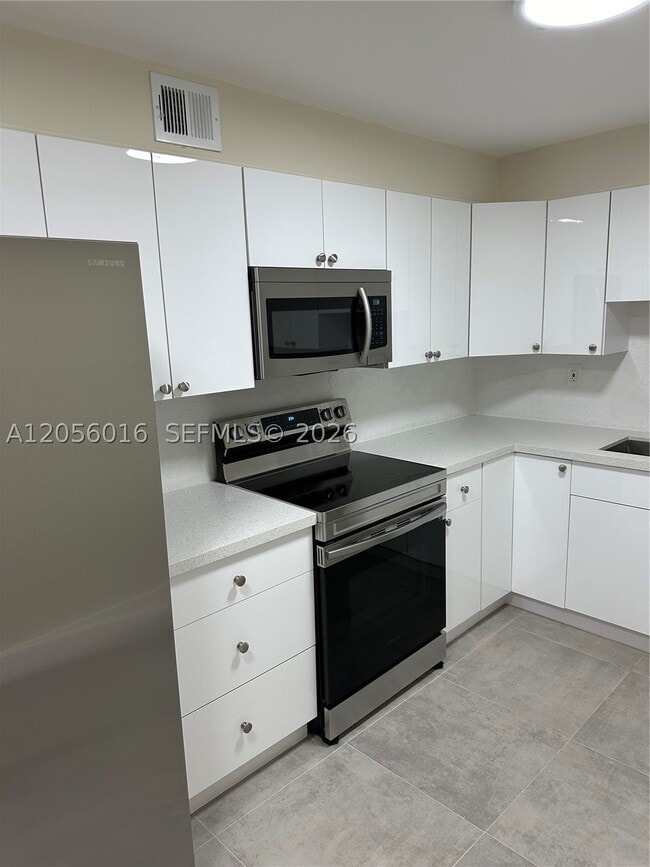 Building Photo - 10090 NW 80th Ct Unit 1421