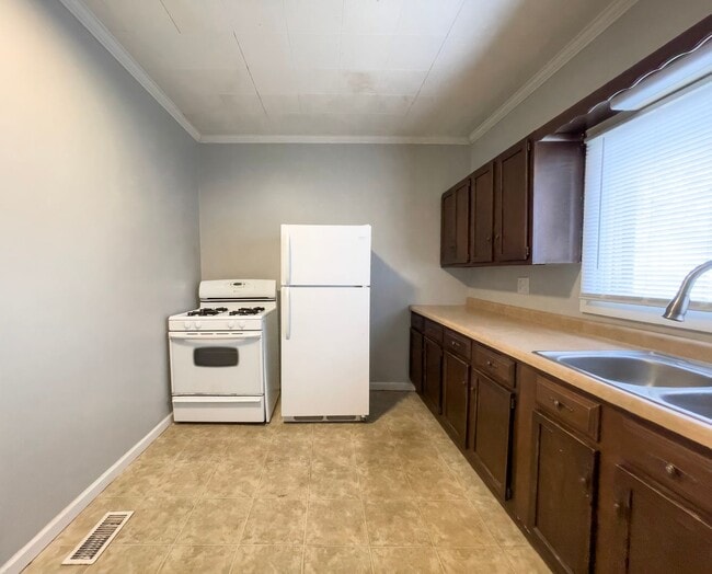 Photo - PRELEASING for AUGUST! Close to Campus