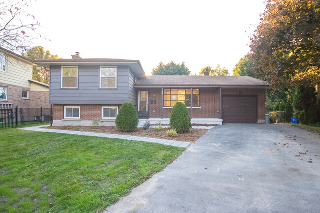 Building Photo - Byron Beauty!   2+ Den Home * Garage * Insuite Laundry * AVAIL NOW Unit UPPER