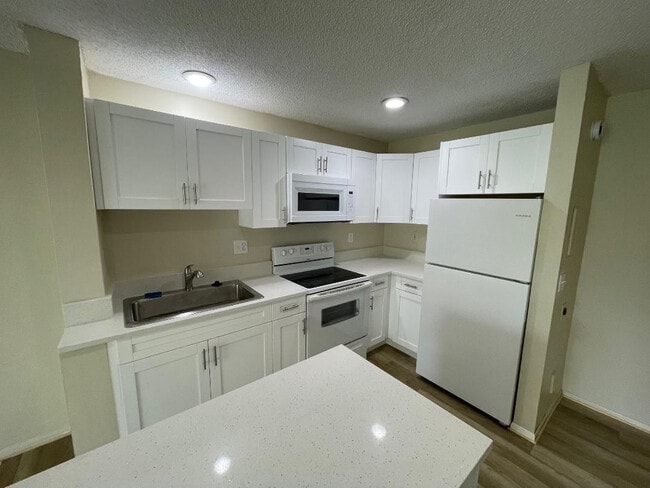 Building Photo - 11372 Royal Palm Blvd Unit 11372